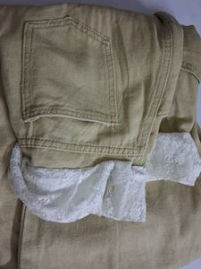 Stylish Women's Jeans with Lace Pocket Detail