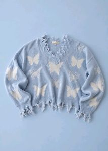 POWDER BLUE BUTTERFLY DISTRESSED CROPPED KNIT SWEA