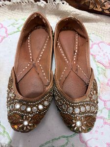 Embellished golden traditional Juttis