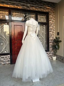 Elegant White Off-Shoulder Wedding Gown
