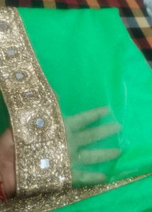 Vibrant Green Blouse with Golden Embellishments