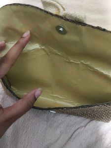 Woven Clutch with Flower Accent