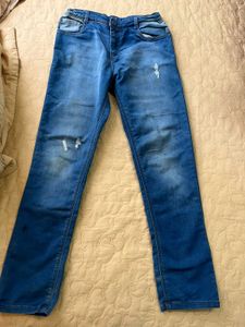 Distressed Blue Denim Jeans