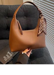 Classic Brown Shoulder Bag with Scarf Accent