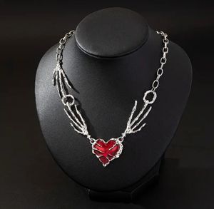 Gothic Skeleton Hand Heart Necklace