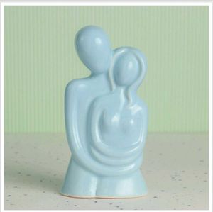 Modern White Couple Sculpture