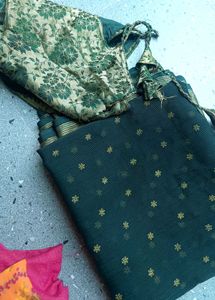 Elegant Dark Green Saree with Golden Accents
