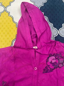 pink sleeveless shirt with cap