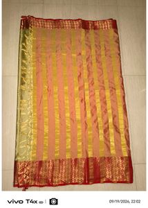 Elegant Golden Saree with Red Border