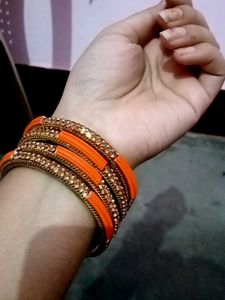 Set of Orange &amp; Silver Bangles