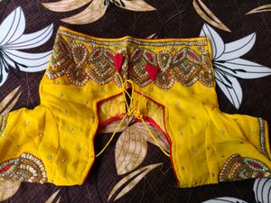 Exquisite Yellow  heavy Embellished Saree
