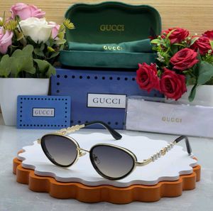 Gucci Oval Sunglasses