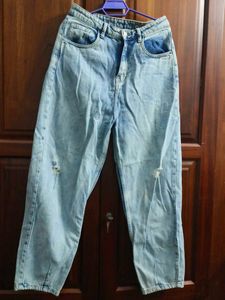 scratched denim jean