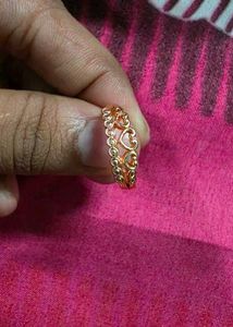 Delicate Gold Ring with Subtle Embellishments