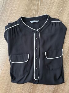 Chic Black Top with White Piping
