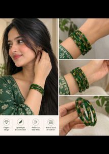 Elegant Green Bangles with Gold Detailing