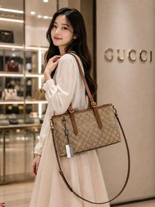 GUCCI GG EMBLEM MEDIUM CANVAS TOTE BAG*