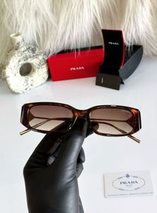 Prada Tortoiseshell Sunglasses