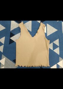 Ribbed V-Neck Top with Ruffle Detail