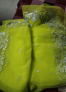 Stunning Yellow Embellished Net Saree