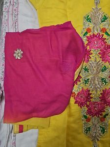 Yellow Kurti With Pink Embroidery