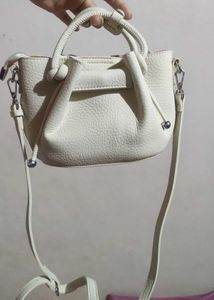 cream bag .