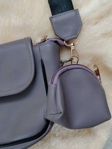 Stylish lavender crossbody bag with coin purse