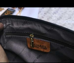 Michael Kors Monogram Crossbody Bag