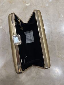 Gold Evening Clutch with Jewel Detail