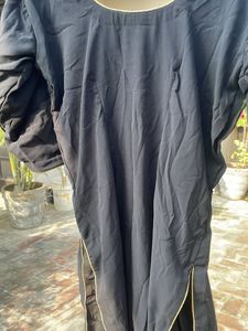 Elegant Black Blouse with Gold Trim