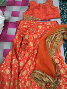Stunning Orange Lehenga Choli with Gold Floral