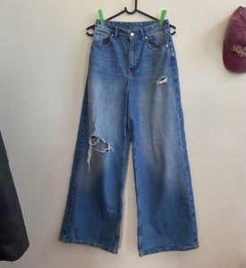 Torn high-waisted Wide Leg Jeans
