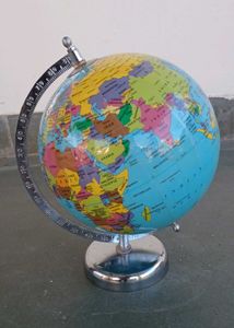 World Globe with Magnifying Glass