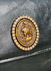 Chic Black Handbag with Embellished Detail