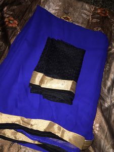 Elegant Blue Saree with Black & Gold Trim