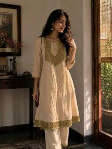 Elegant Cream Kurta with Gold Embellishments