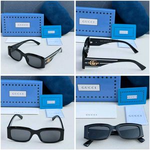 Gucci Sunglasses Black with Gold Detail