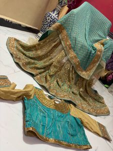 designer saree with worked blues
