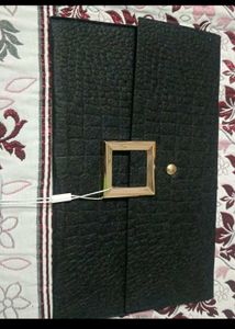Elegant Black Clutch with Gold Buckle