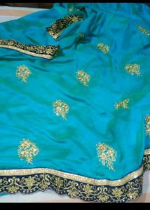 Stunning Teal Saree with Gold Embroidery