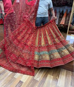Stunning Red &amp; Gold Embellished Lehenga Choli