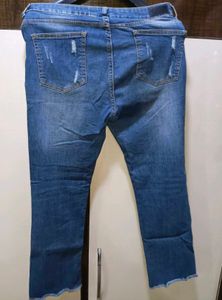 Ripped Blue Denim Jeans