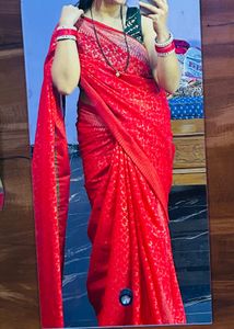 Vibrant Red Saree with Intricate Silver Weave