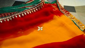 elegant mustard yellow and red Saree with Mirror
