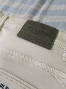 Cream Straight Leg Jeans