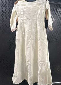 Elegant White Kurta with Embellished Neckline