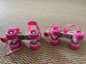 Pink Roller Skates for Kids and  inflatable p