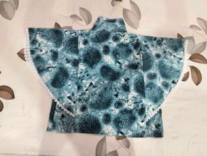 Stylish Blue Printed Top with Lace Detail