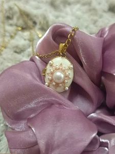 Elegant Pearl and Enamel Pendant Necklace