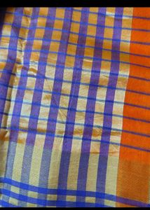 Vibrant Checked Orange Saree with blouse pc